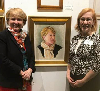 Lynne Vanderslice and I, in front of her portrait.